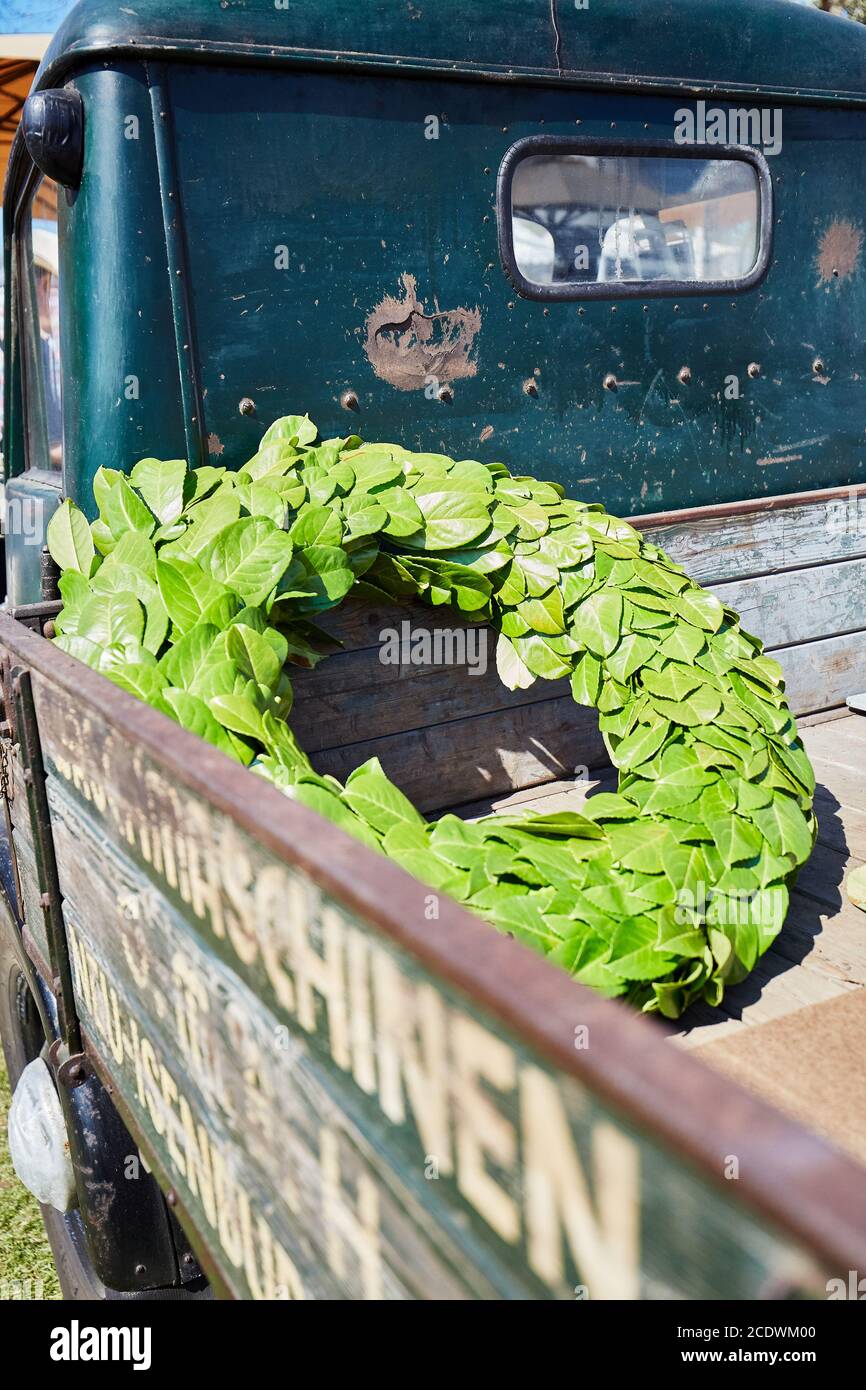 Laurel wreath on the loading area of an oldtimer truck Stock Photo