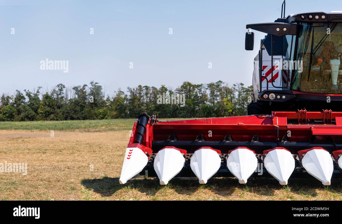 Combine harvester on a field Stock Photo