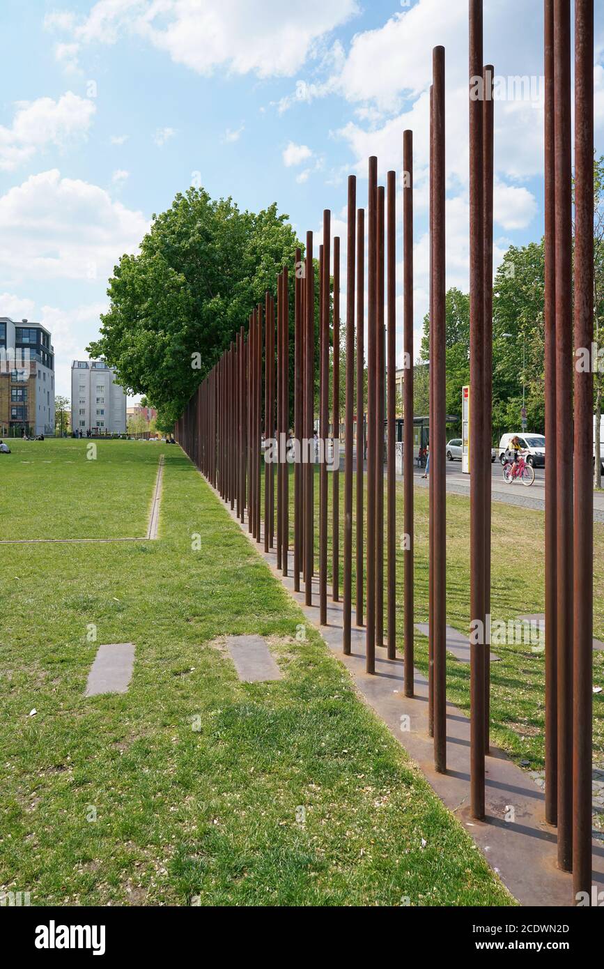 The former course of the Berlin Wall in Bernauer Strasse marked by metal bars Stock Photo