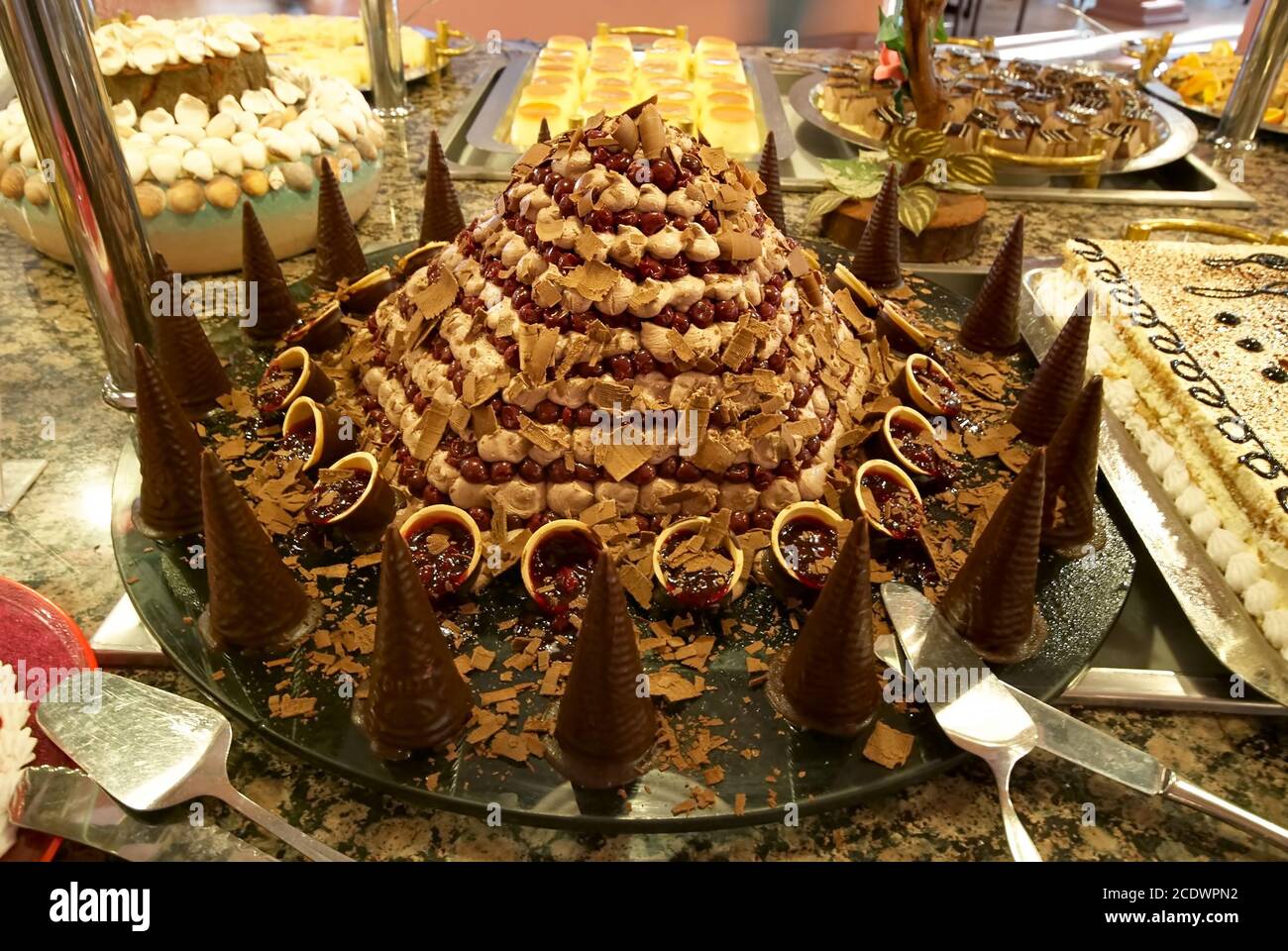 Turkish cake in pyramid shape. Traditional Turkish delight in the hotel buffet in Turkey. Antalya region, South Turkey Stock Photo