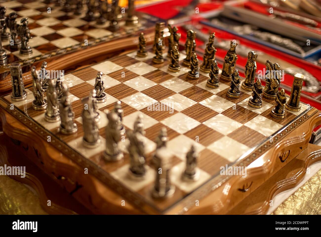 Beautiful chess set for sale on Grand Bazaar, Turkey. Made of wood and metallic materials. Chessboard, classic game, strategic, strategy, turkish Stock Photo