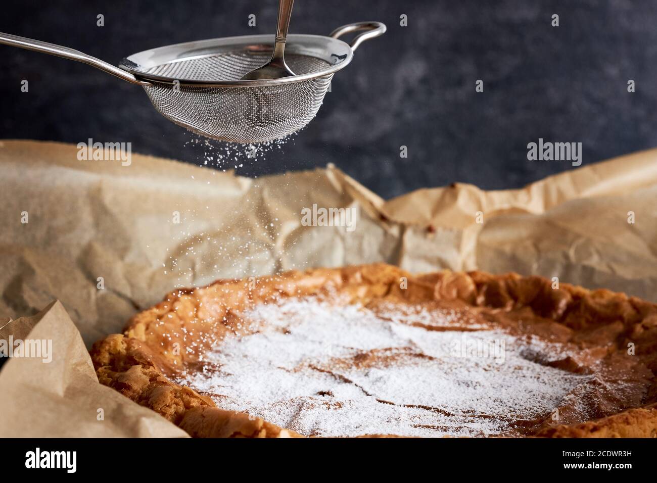 Cake is decorated with powdered sugar Stock Photo