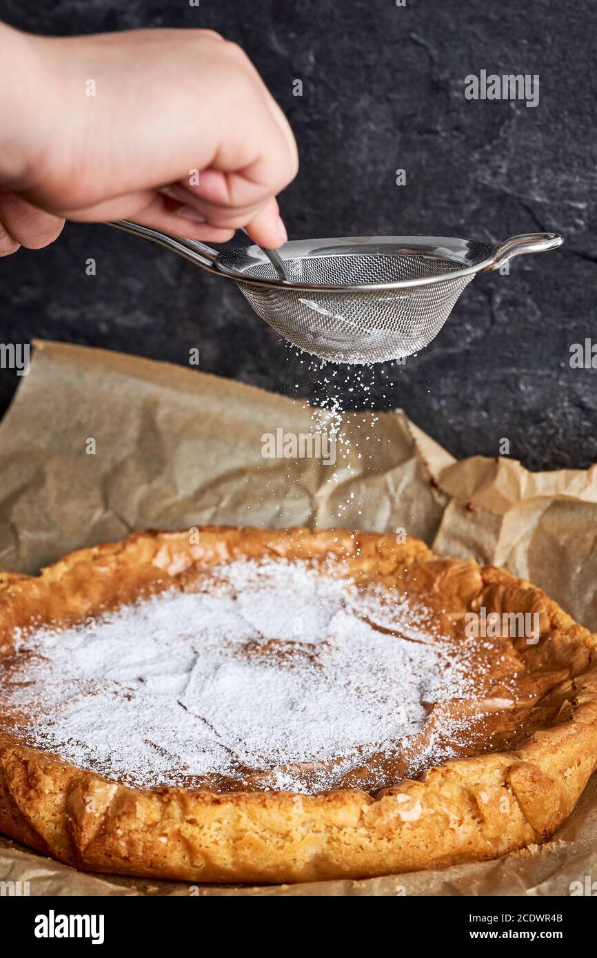 Cake is decorated with powdered sugar Stock Photo