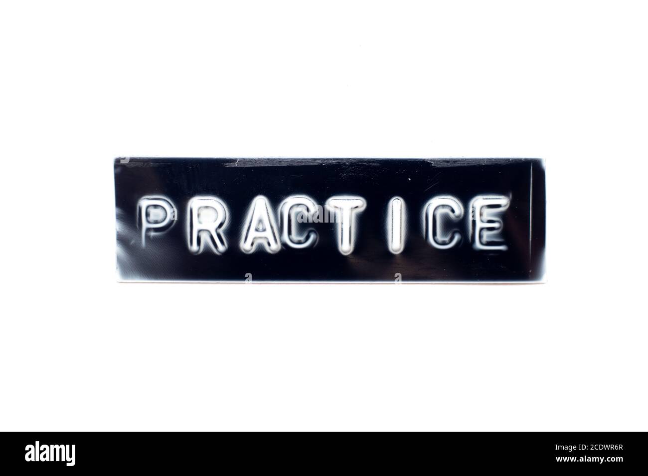 Embossed letter in word practice in black banner on white background