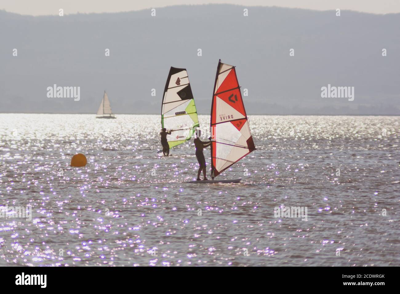 PODERSDORF, AUSTRIA - unidentified windsurfers in Podersdorf, Austria on Neusiedler Lake Stock Photo
