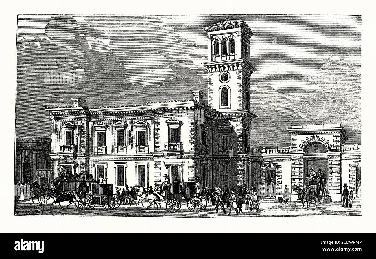 An old 1840s engraving of London Bridge Station, Borough, London, England, UK. It was opened in 1836, making it the oldest London railway terminus that is still used. The station was originally opened by the London and Greenwich Railway as a local terminus. It subsequently served the London and Croydon Railway, the London and Brighton Railway and the South Eastern Railway, becoming an important London station. This engraving shows the design for the rebuilt station, completed in 1849. Rebuilding work took place again in 1864 to provide more services and increase capacity. Stock Photo