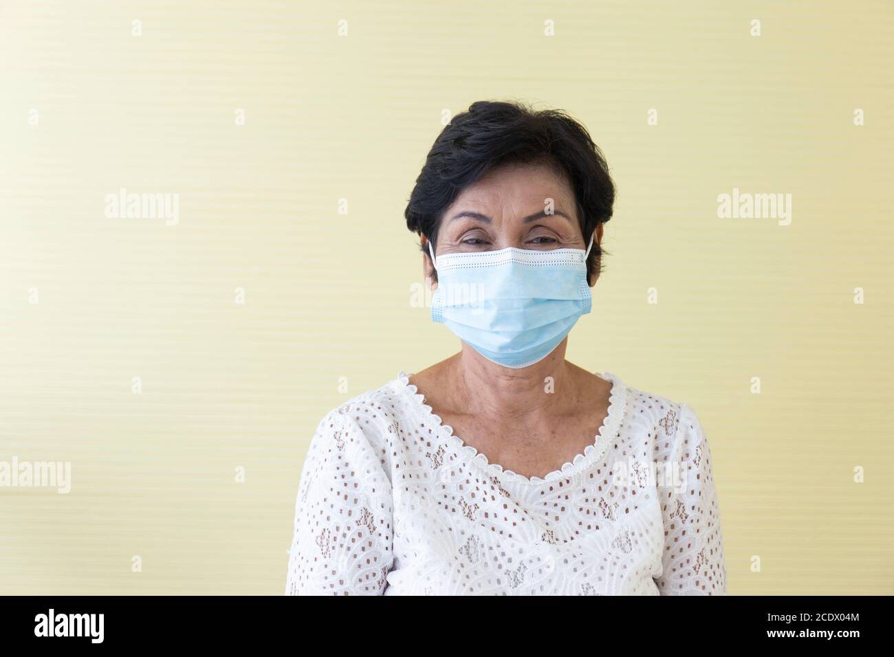 Asian women wear masks to protect against pollution and the Colona virus-19. Stock Photo