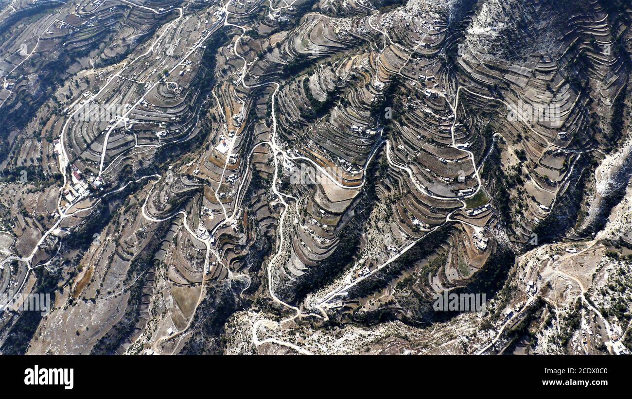 View from above of the terrace fields and small houses at the foot of the volcanic foothills of the Nevado de Toluca in Mexico Stock Photo