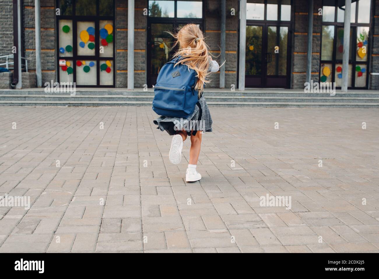 Little Girl Running Back View High Resolution Stock Photography and