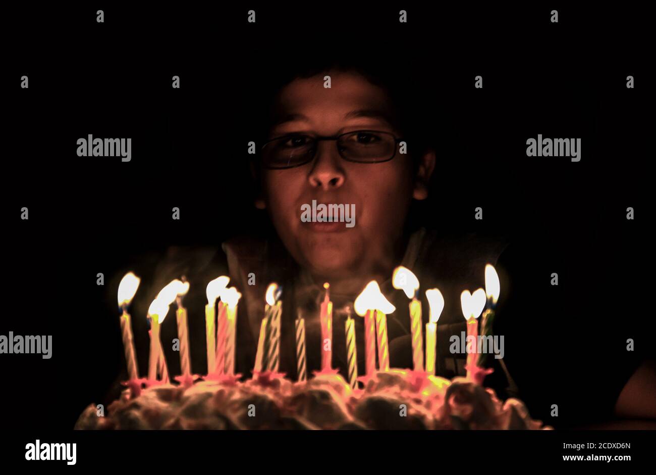 photography of boy blowing candles in high quality Stock Photo Alamy