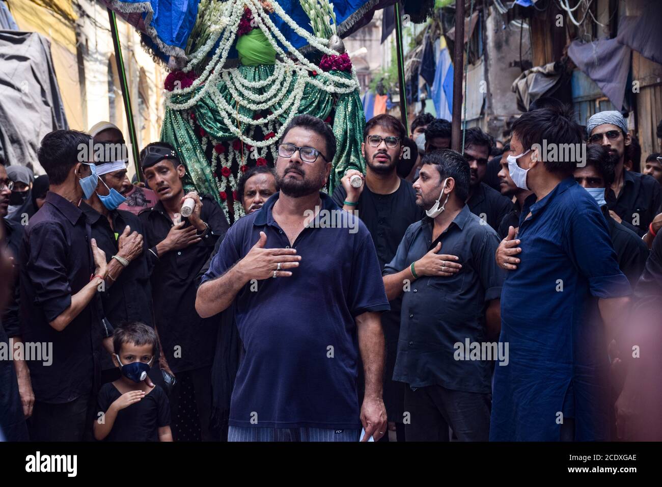 Muslims take part in a Muharram procession.Muharram is the holy ...