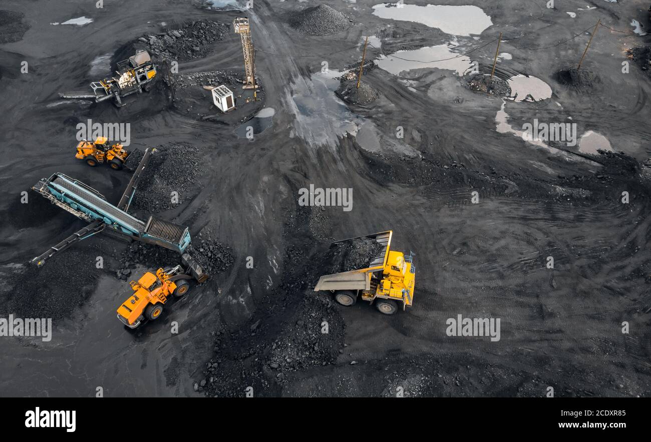 Coal mining an open pit extractive industry, top view aerial Stock