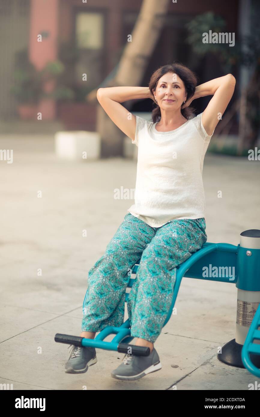 Outdoor portrait of a beautiful senior woman Stock Photo - Alamy