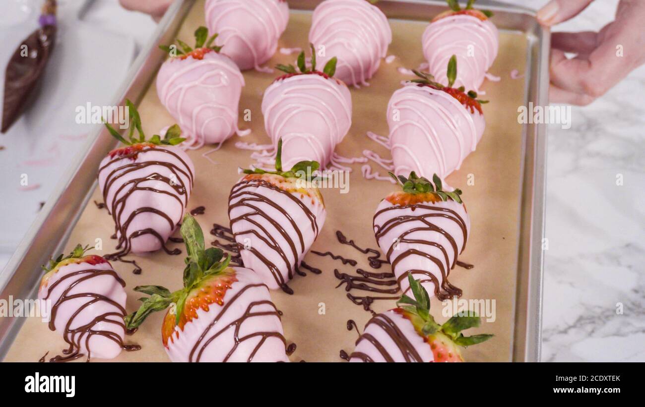 Step by step. Variety of chocolate dipped strawberries on a parchment