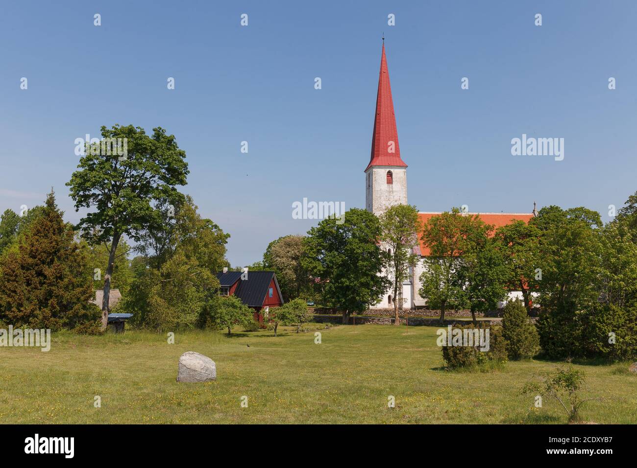 Ancient Lutheran church in Kihelkonna, Saaremaa, Estonia. Early autumn sunny day. Landscape view. Stock Photo