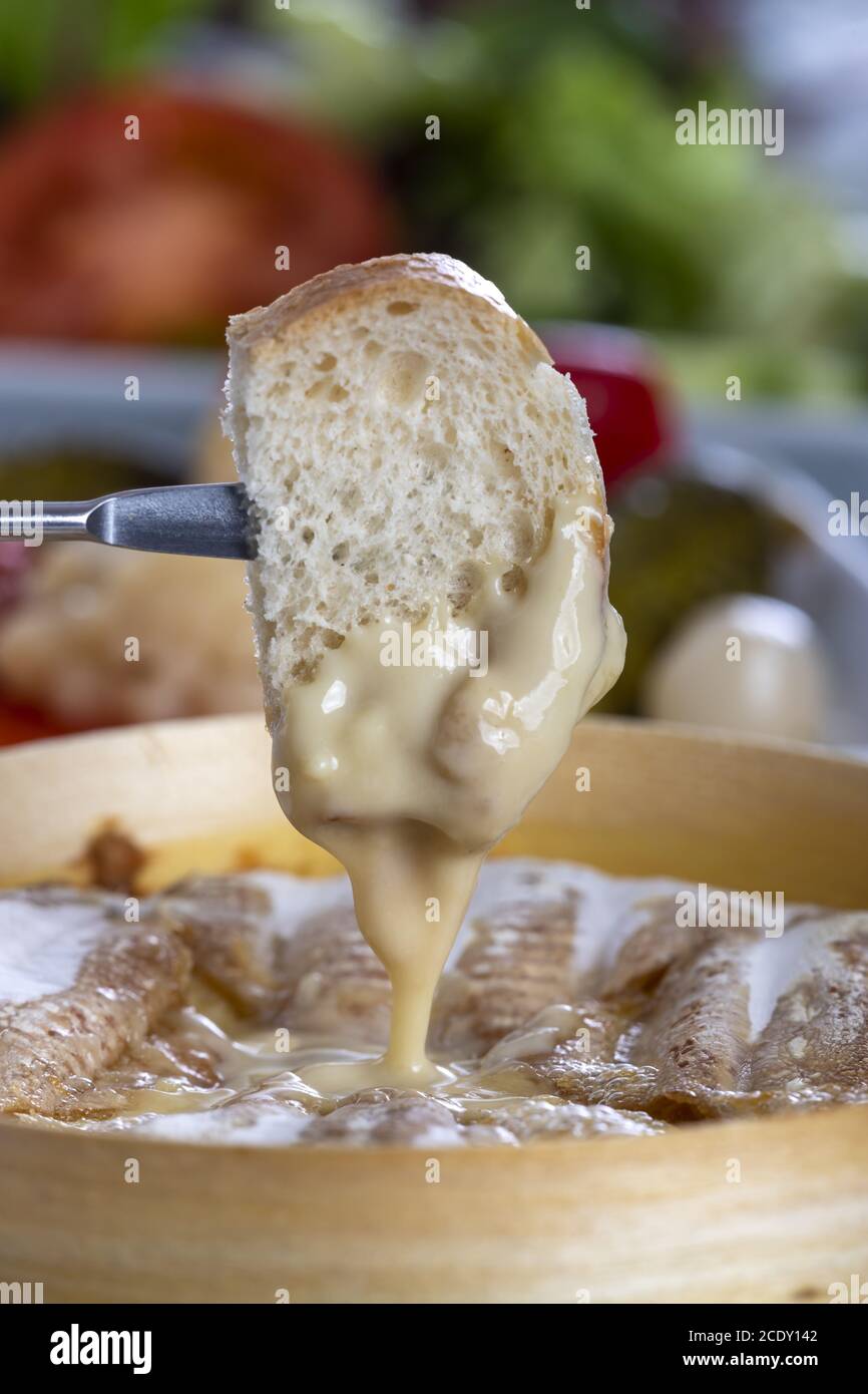 Swiss cheese fondue with bread Stock Photo Alamy