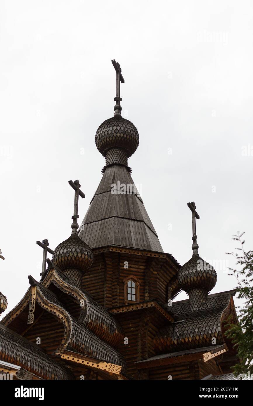 Domes and crosses of a beautiful wooden Orthodox church against the ...