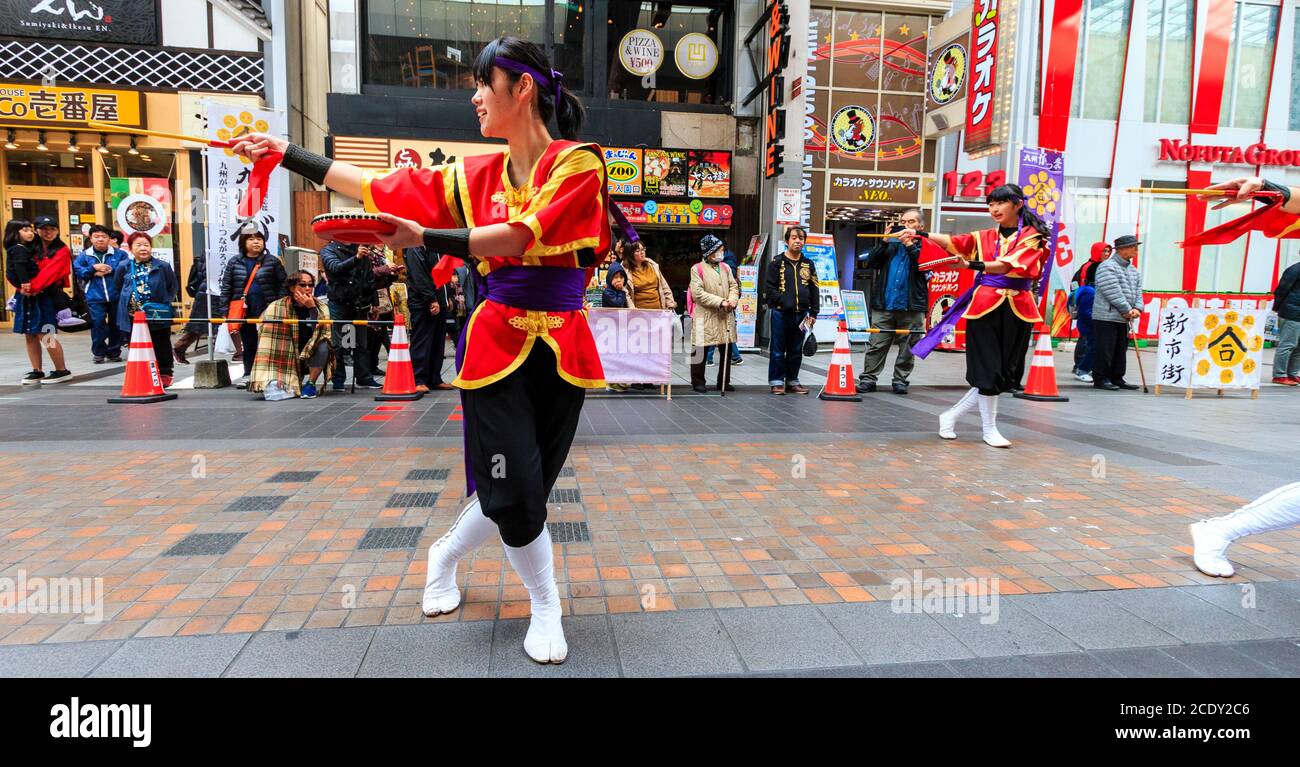Close up of Japanese women yosakoi dance team, dancing with tambourines
