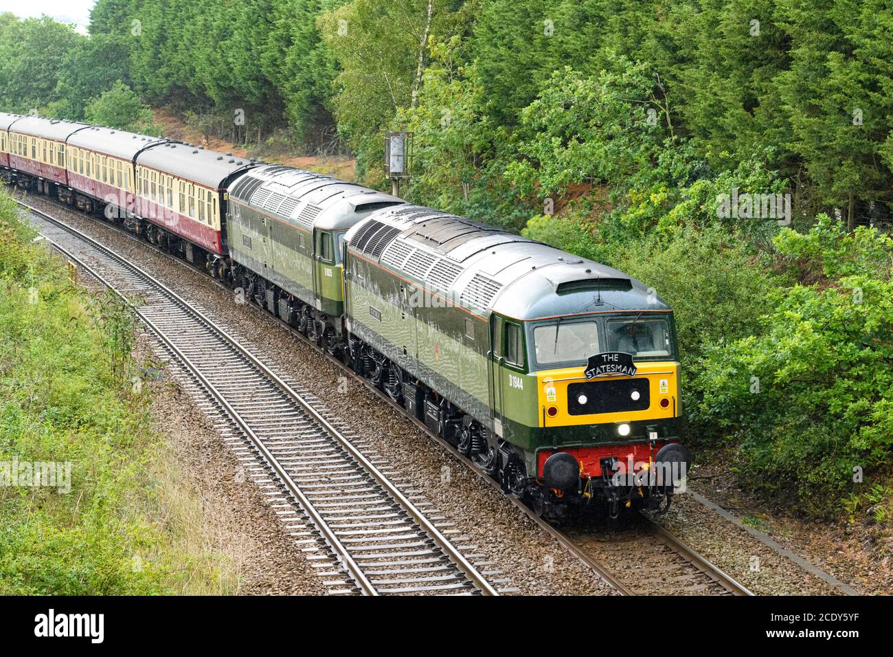 Class 47 diesel locomotives D1944 and D1935 double head The Statesman charter train approaching Newton Abbot south Devon UK. Stock Photo