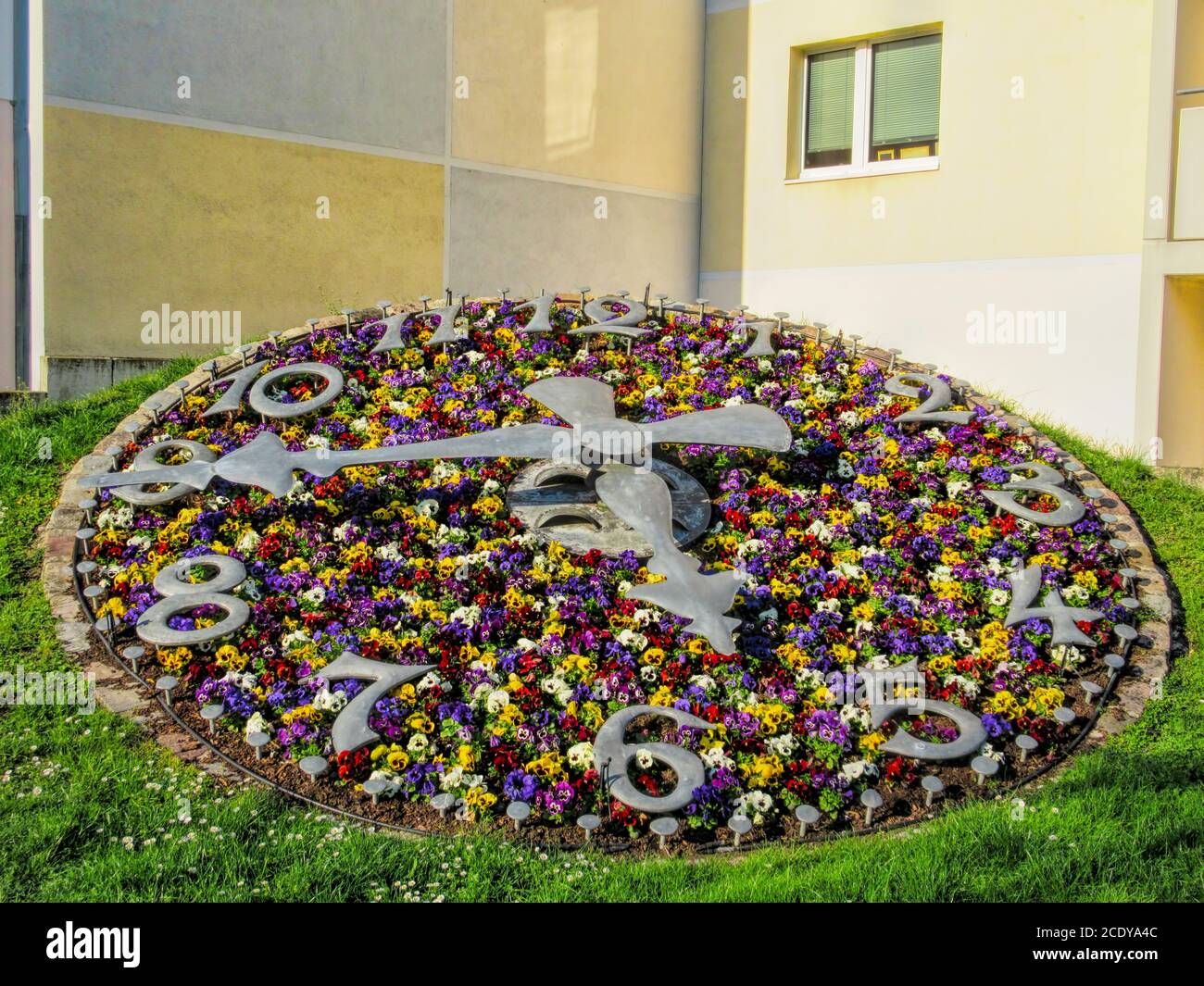 Colorful flower clock in Erkner, Germany Stock Photo