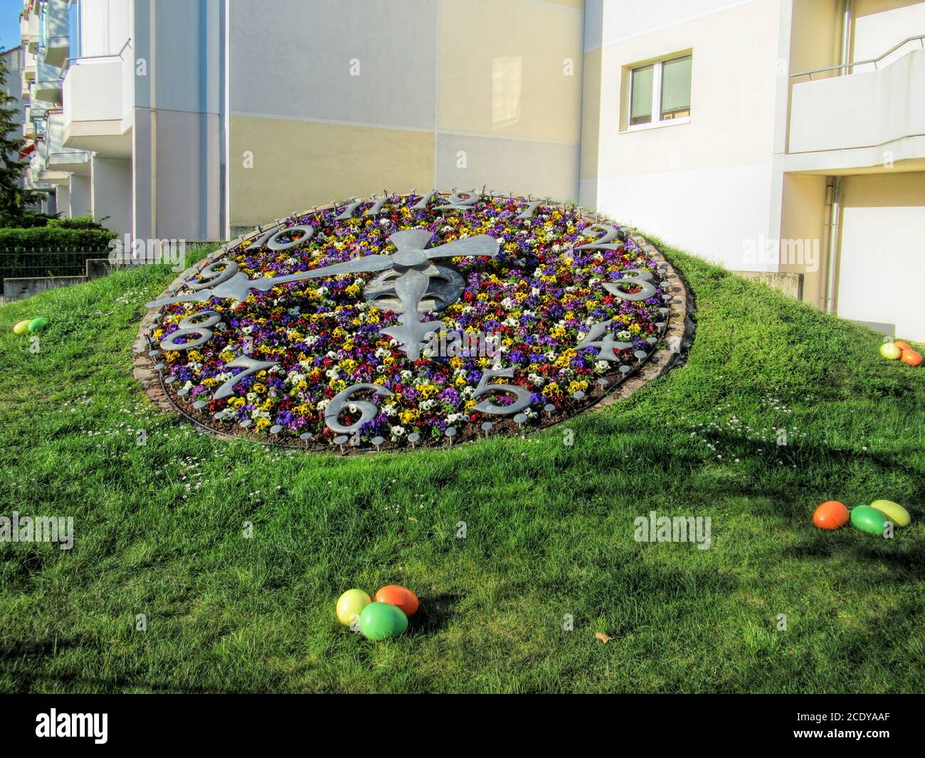 Sundial with Easter eggs in Erkner, Germany Stock Photo