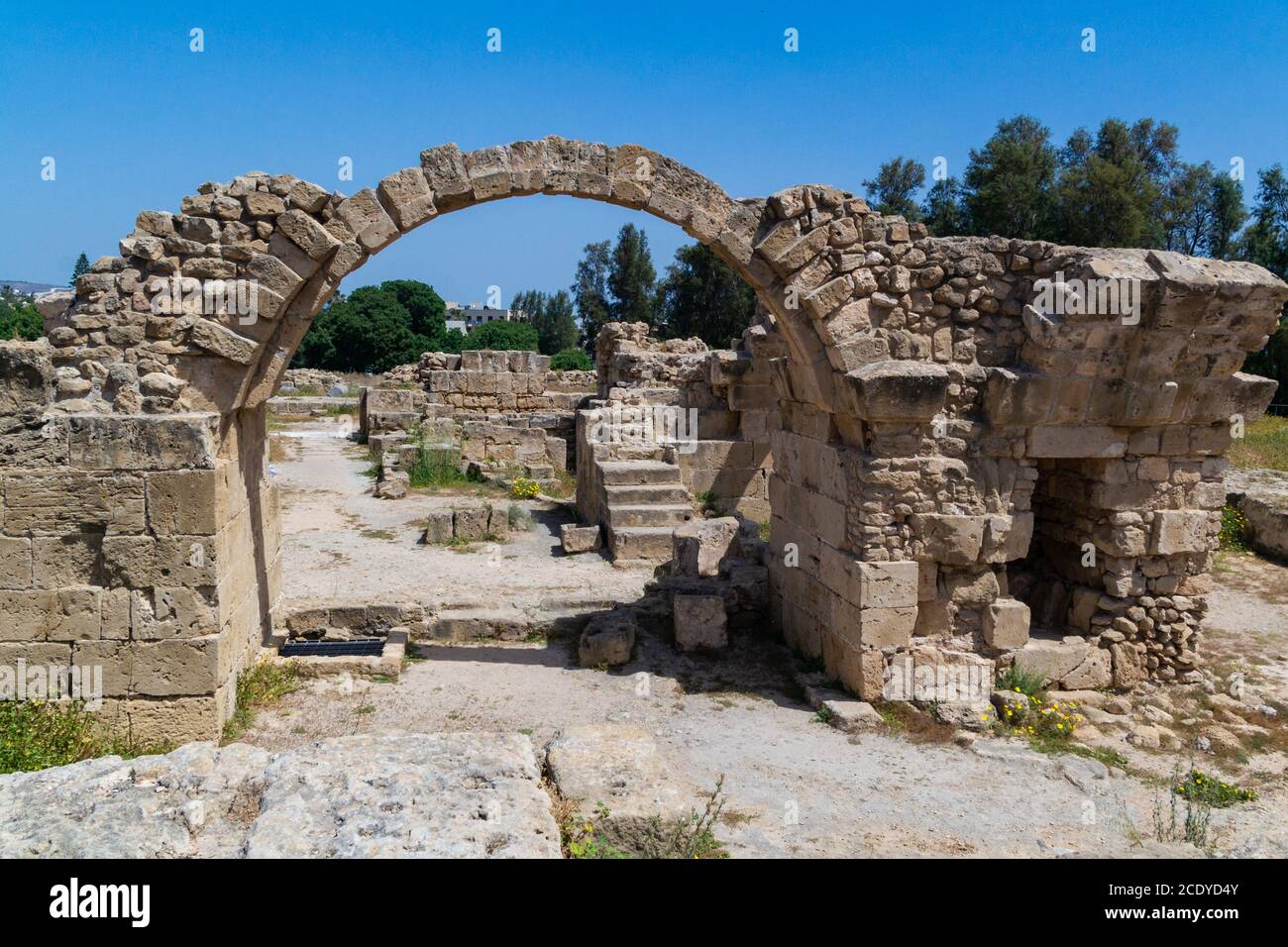 Ancient Roman arch in Paphos archaeological park at Kato Pafos in Cyprus. Stock Photo