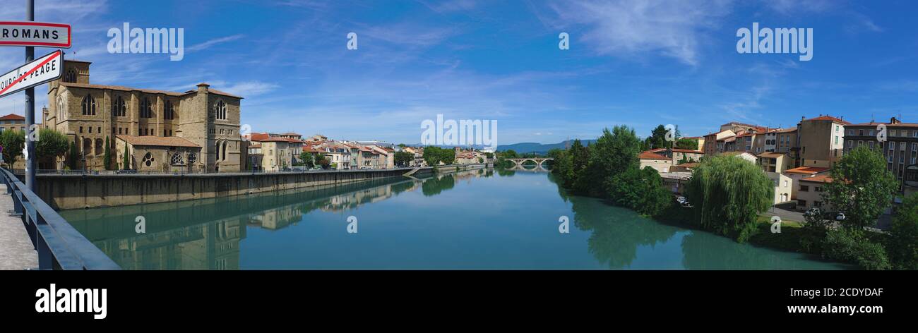 Panoramic view of the Isere river on the Old Bridge connecting Romans-sur-Isere to Bourg de Peage Stock Photo