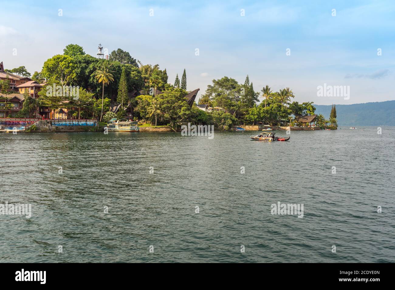 View from Lake Toba to Tuktuk the small peninsula of Samosir island, in North Sumatra Stock Photo