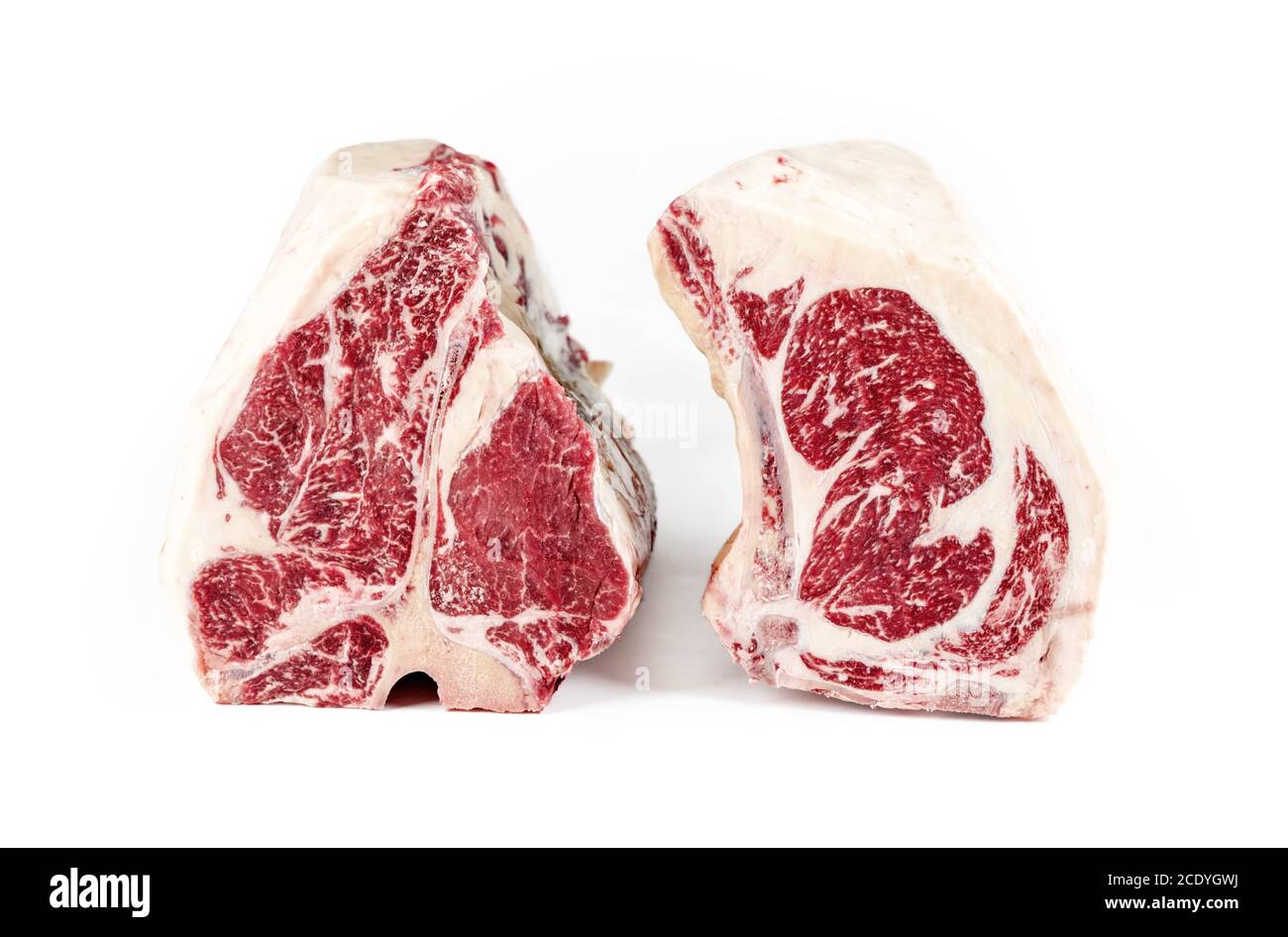 Raw dry aged wagyu porterhouse and cote de boeuf beef block as closeup