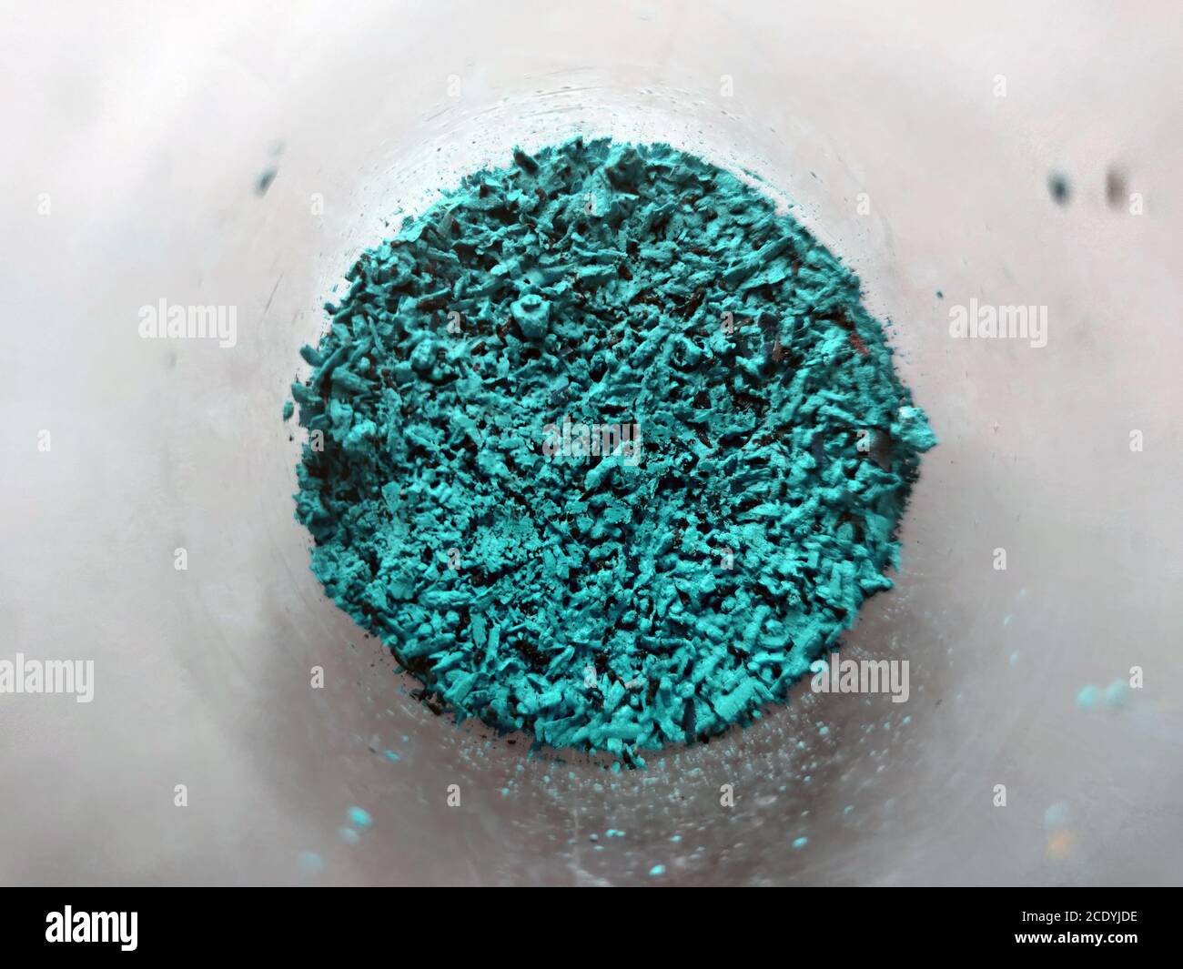 Azure powder in glass cup, bowl with ingredient close up. colored ...
