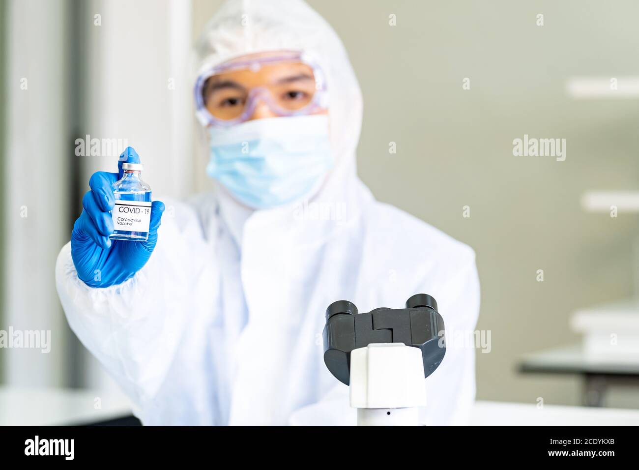 Scientist hold vaccine Stock Photo