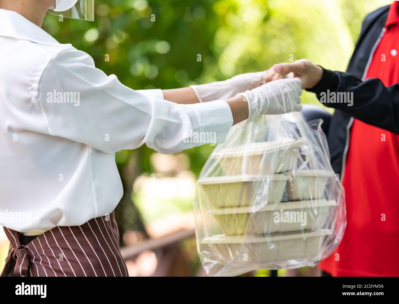 Deliverly man pick up food order Stock Photo