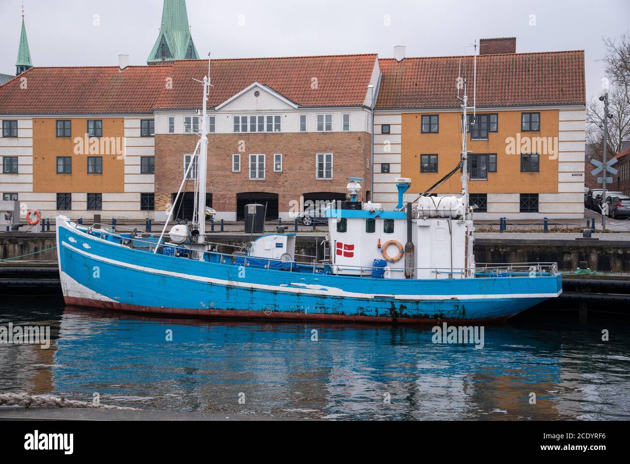 Fishing boat in Helsingør (DK) on a cloudy day Stock Photo