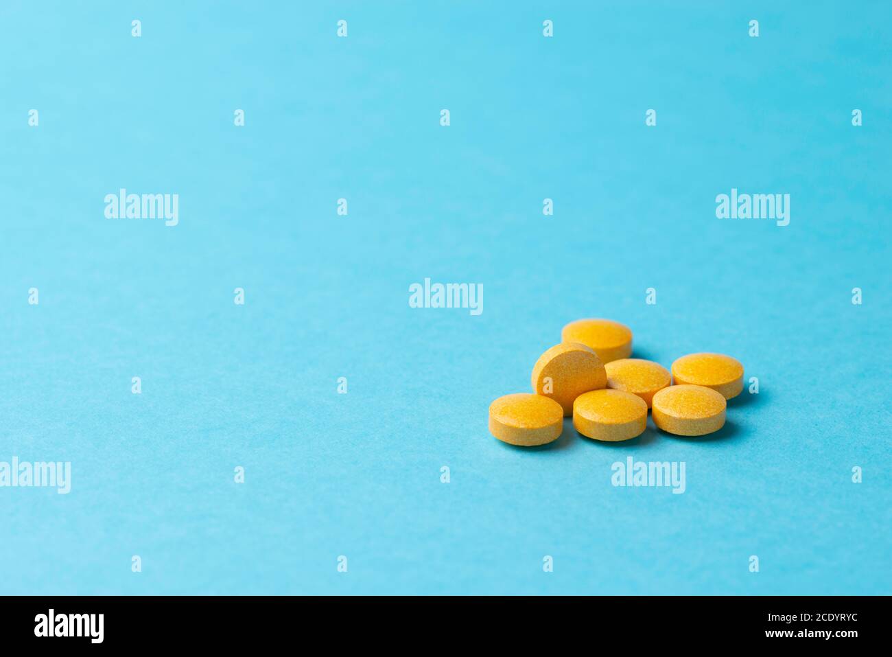 Medicines, tablets on a blue background. Stock Photo