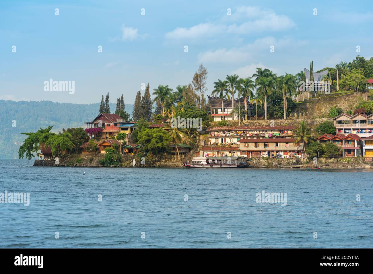 Hotels and Traveller Accommodation on the shores of Lake Toba in Sumatra Stock Photo