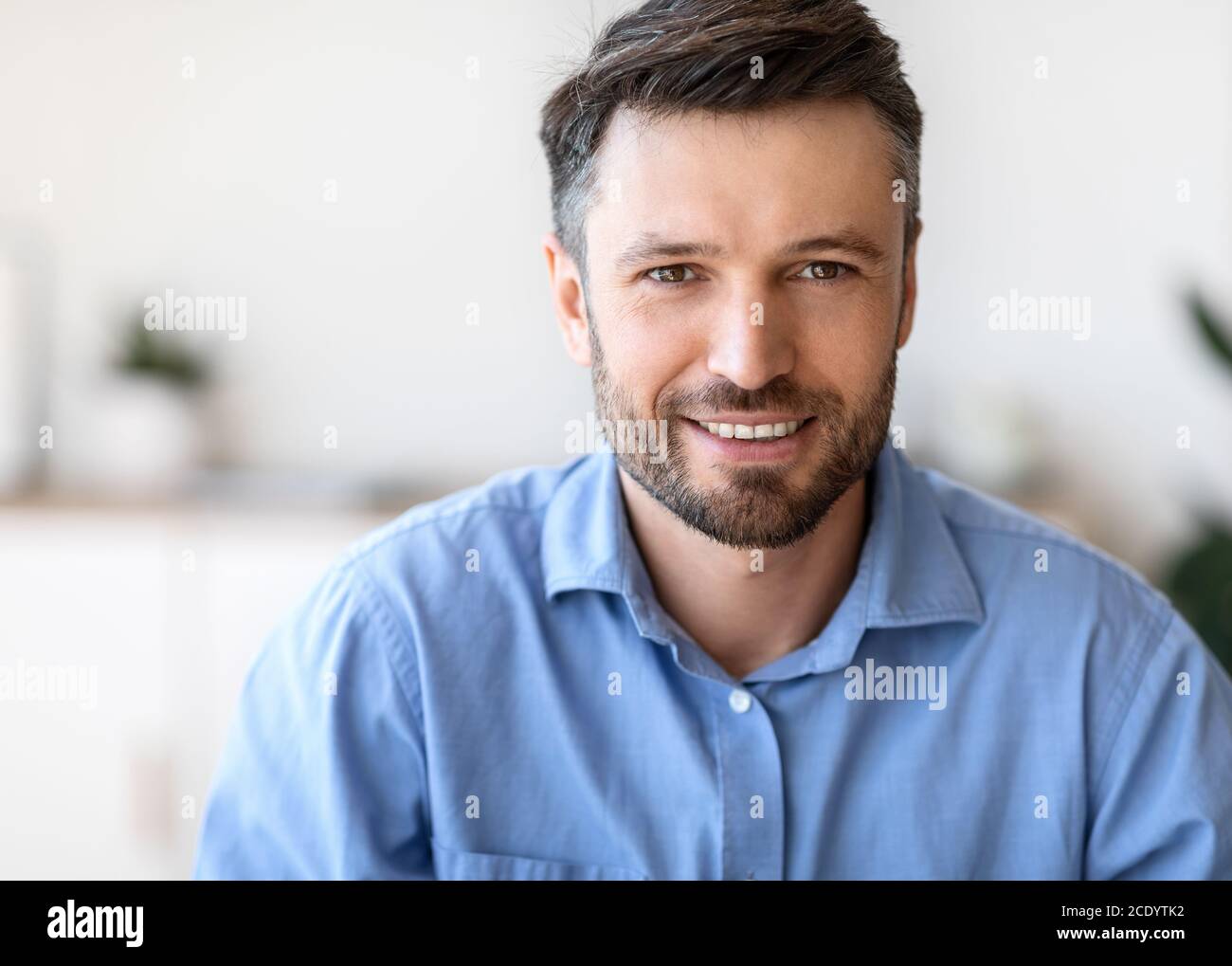 Successful Entrepreneur. Closeup Portrait Of Handsome Young Businessman Smiling At Camera Stock Photo