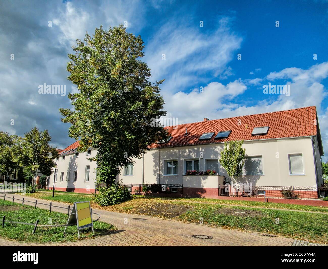 diedersdorf, germany - dorfstrasse with a renovated row of houses Stock Photo