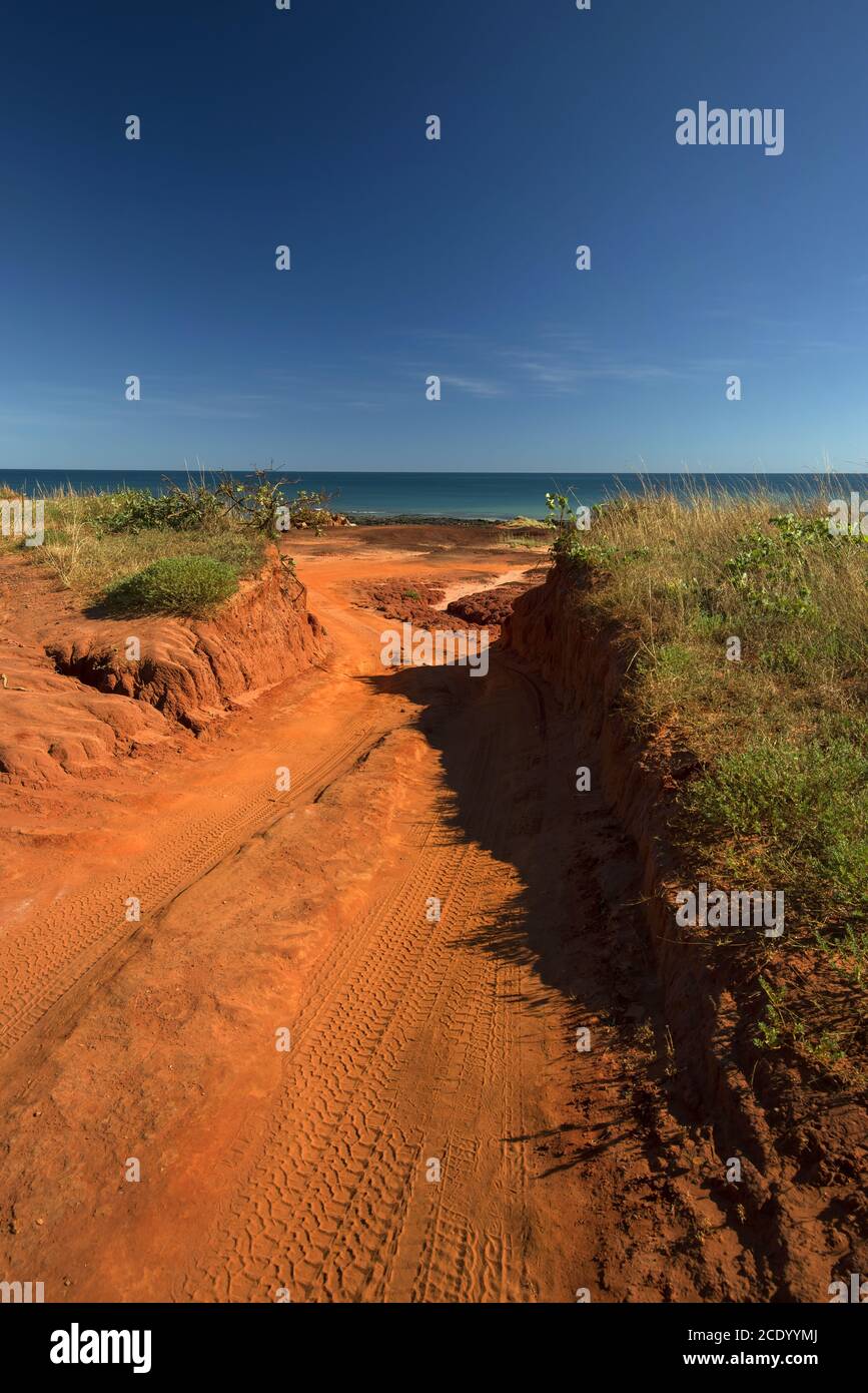 Western Australia Outback sand track for 4WD car downhill to the ocean at Dampier Peninsula