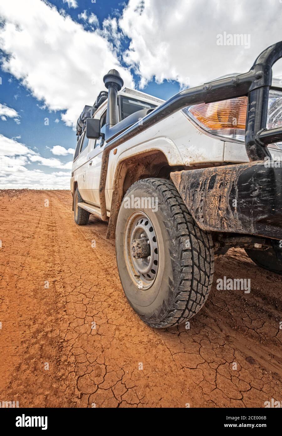 South Australia Outback desert with 4WD on track under cloudy sky Stock Photo Alamy