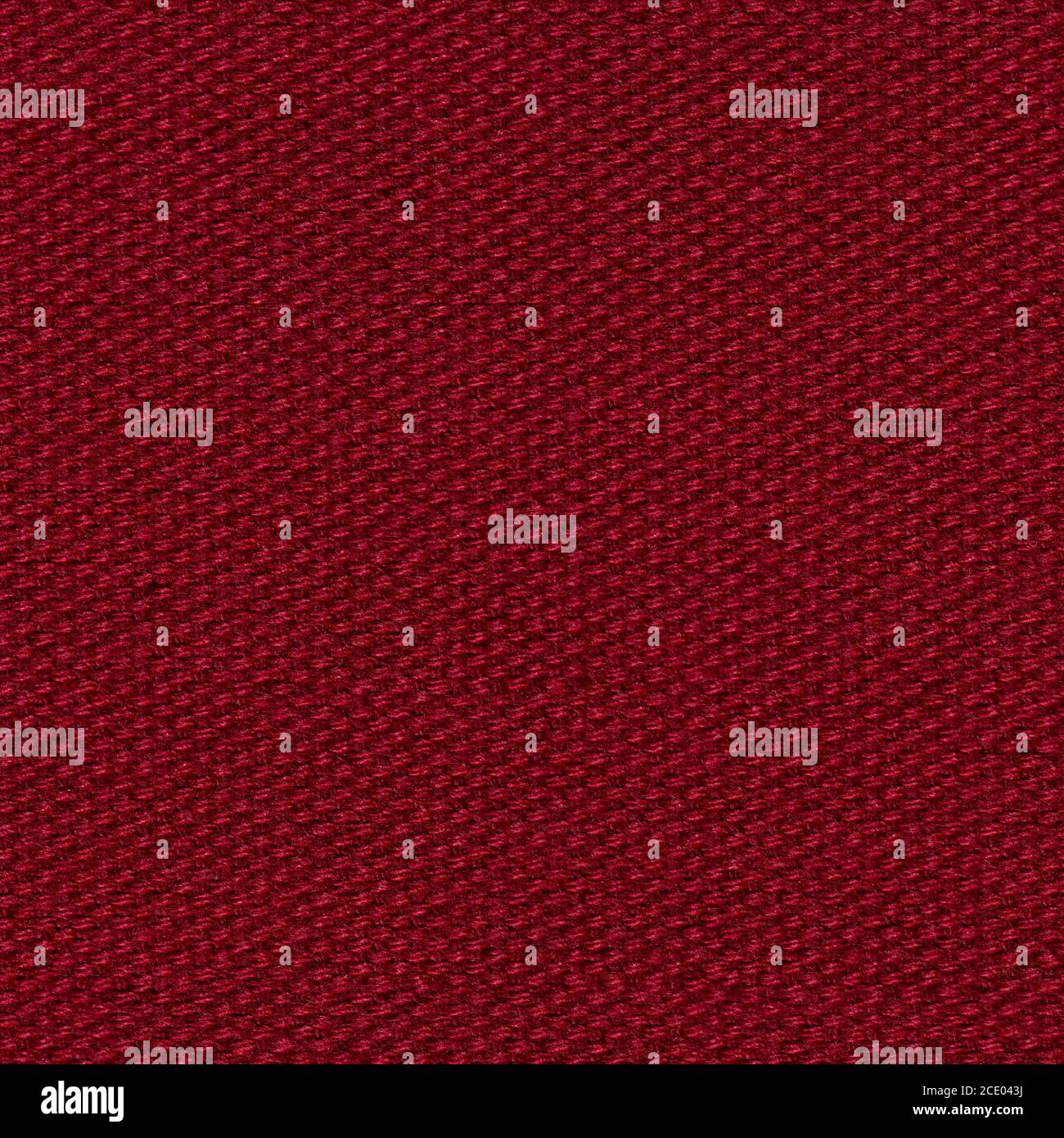 Usual dark red textile background for interior. Seamless square texture. Stock Photo