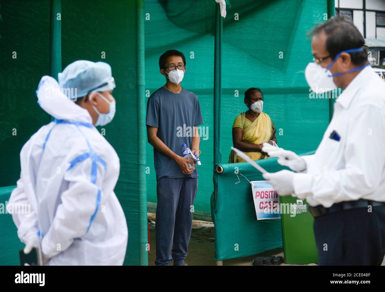 Guwahati, Assam, India. 30th Aug, 2020. Health worker arrived at a swab collection centre to take positive patients to the hospital for COVID-19 coronavirus treatments, in Guwahati. Assam crossed the one lakh(100 Thousand) coronavirus cases mark on Friday night 28 August 2020. Credit: David Talukdar/ZUMA Wire/Alamy Live News Stock Photo