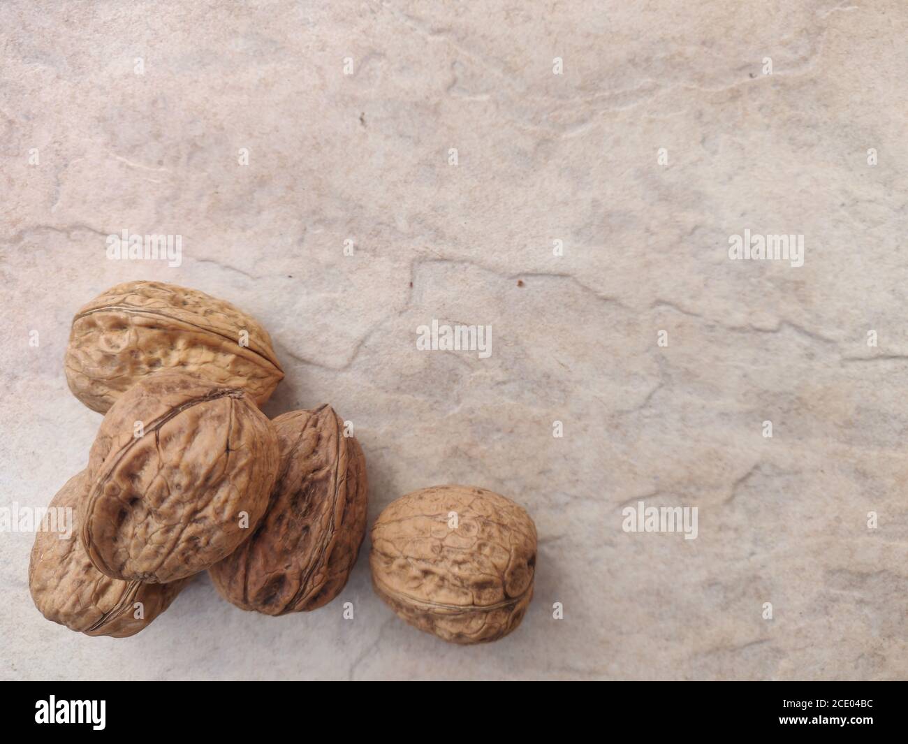 walnuts with white marble background. high quality image. food Stock Photo
