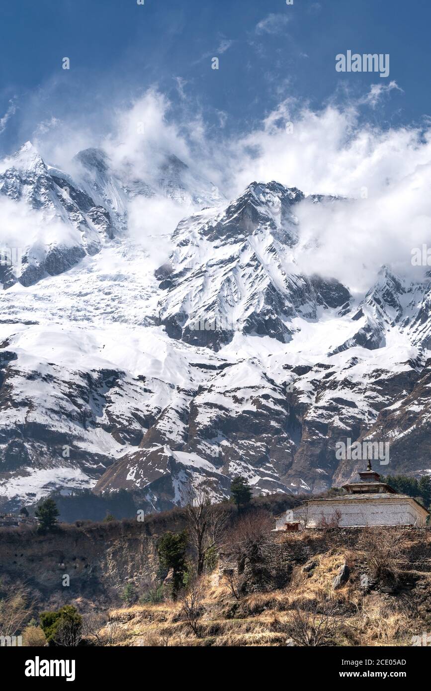 The view on Dhaulagiri peak and buddhist monastery Stock Photo