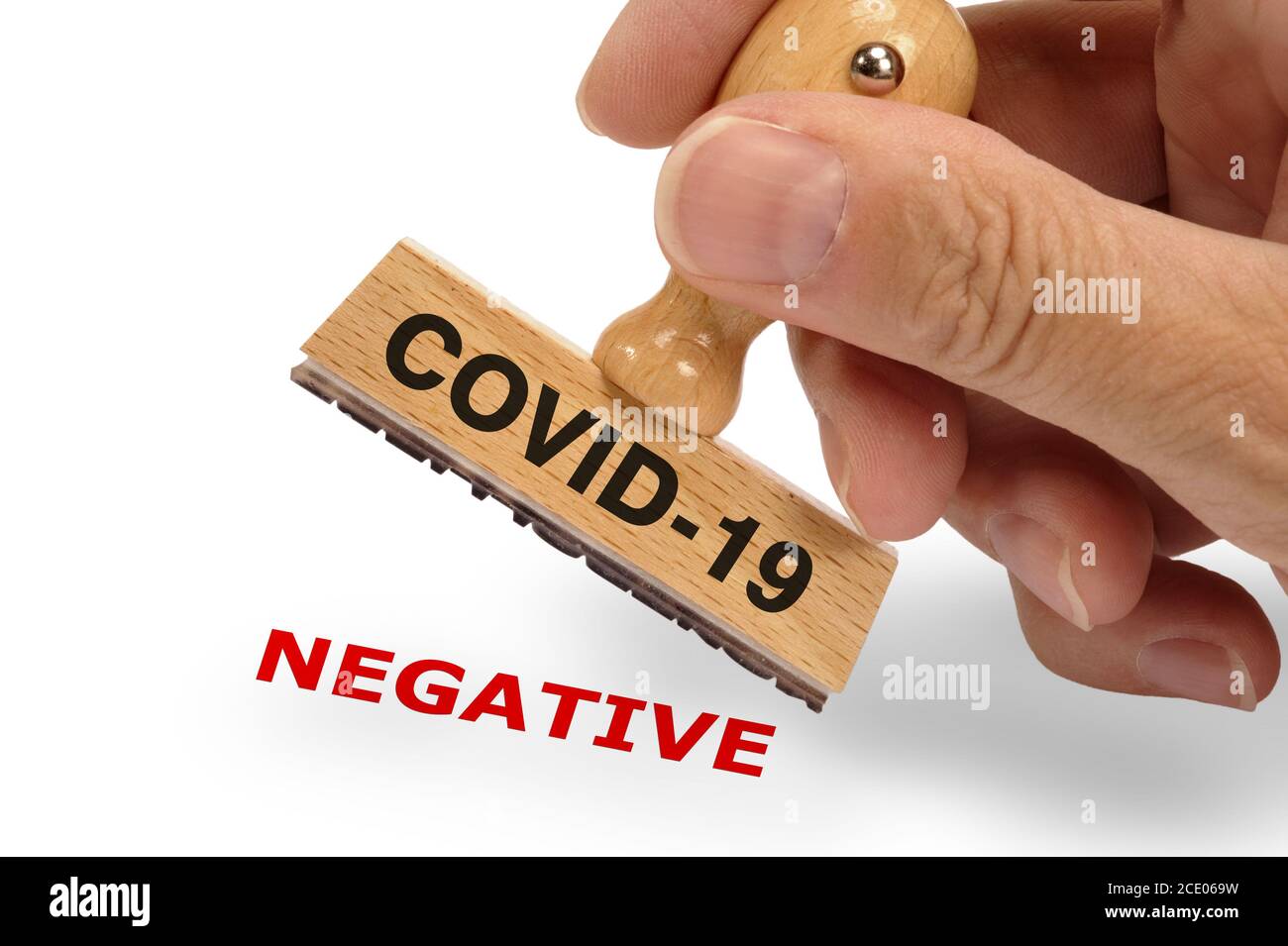 covid-19 virus printed on rubber stamp Stock Photo