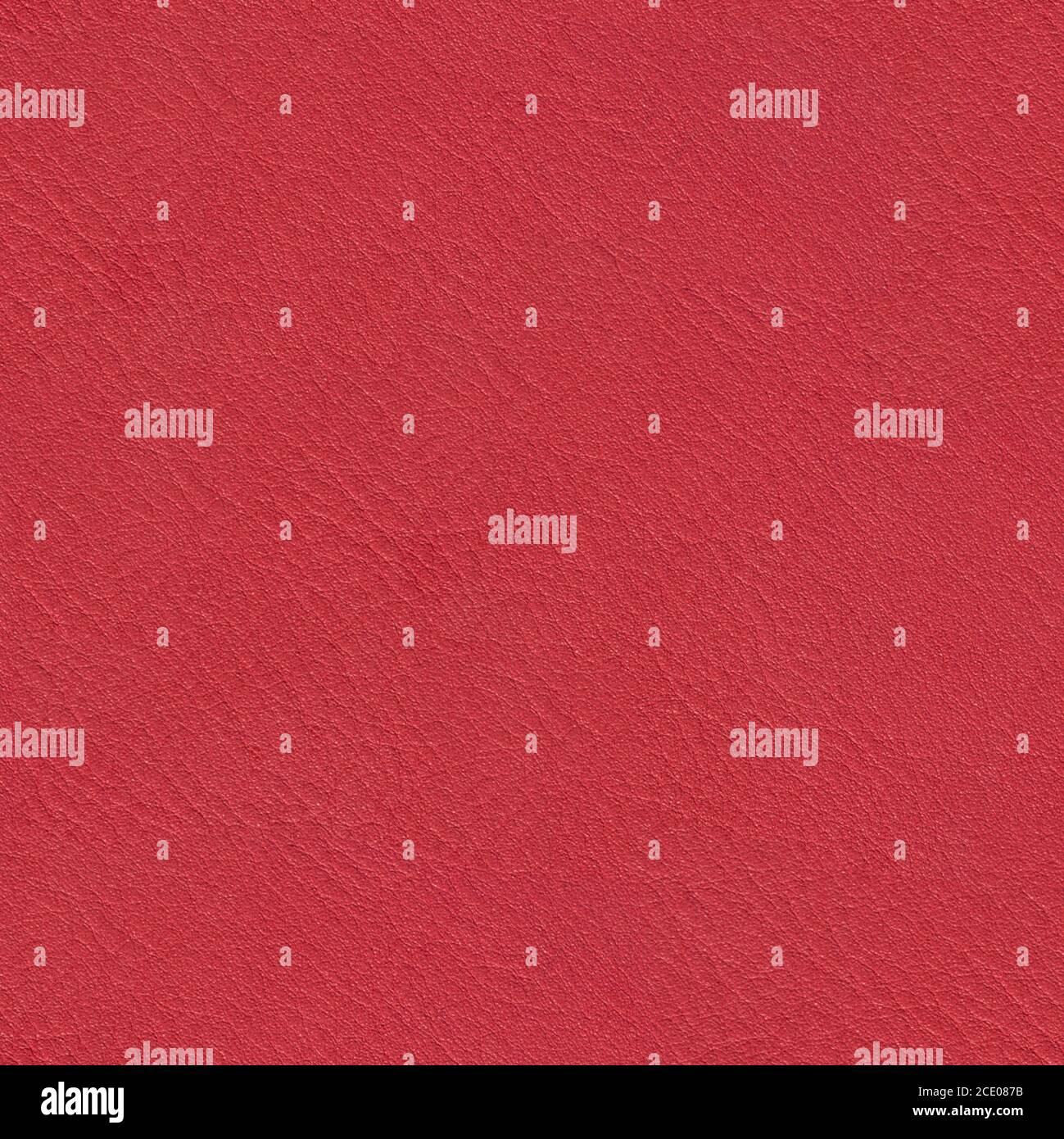 Bright red leather texture. Seamless square background, tile ready. Stock Photo