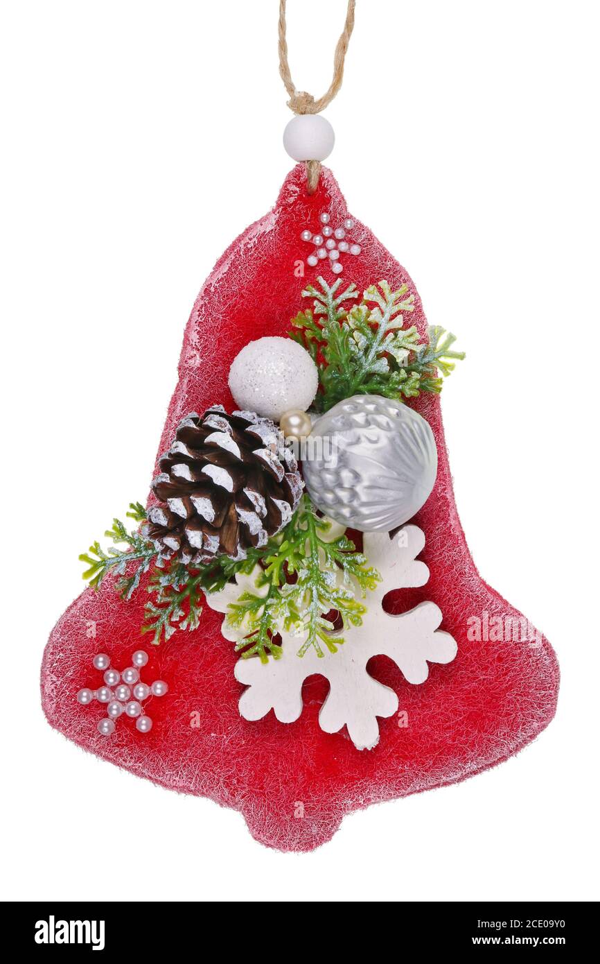 Christmas homemade toy bell  in rustic style made  of pine cone plastic and glass isolated macro Stock Photo
