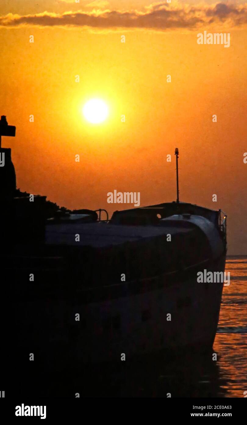 sunset over the Baltic Sea with trawler Stock Photo - Alamy