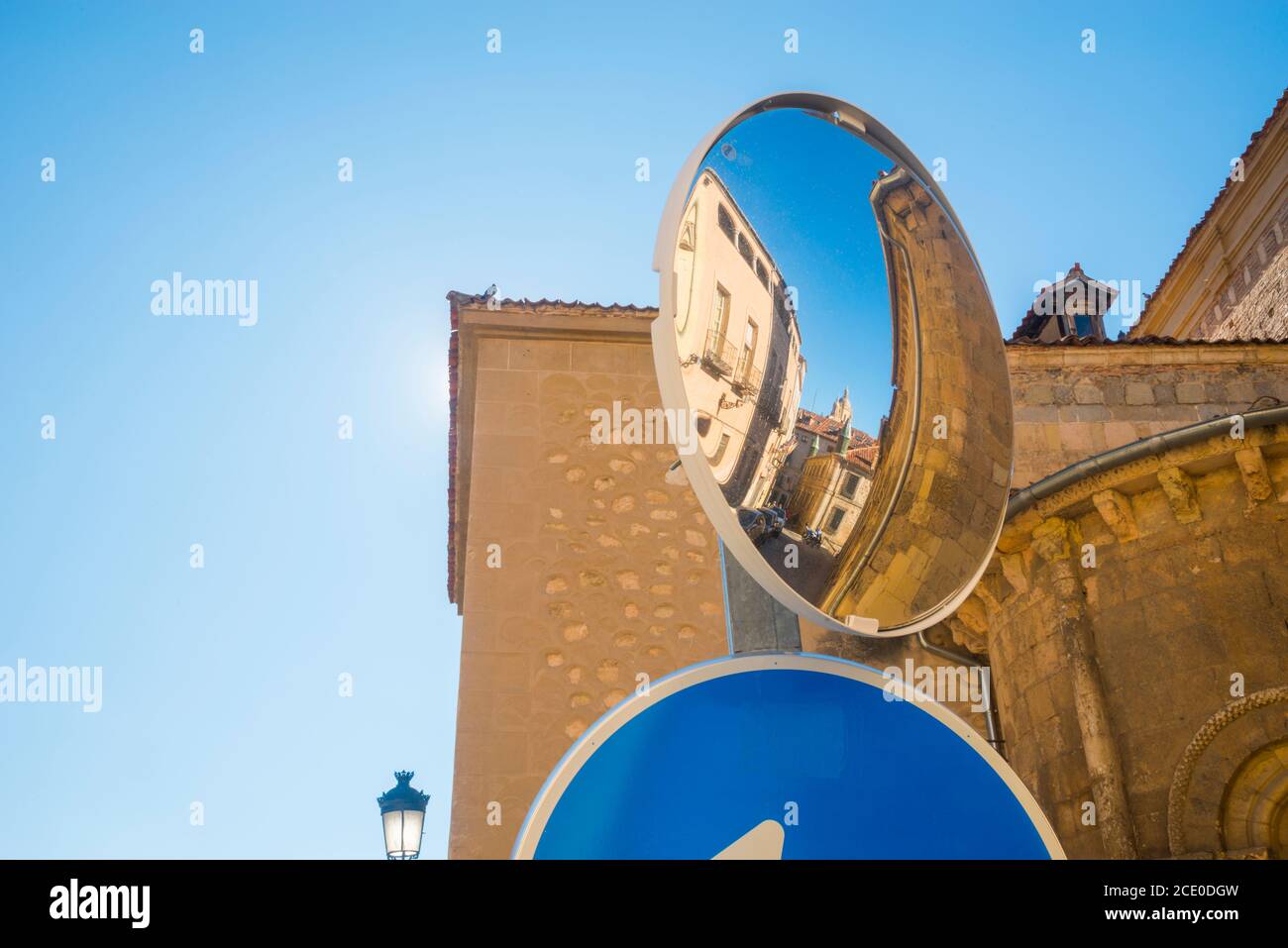 City reflected on street mirror. Segovia, Spain. Stock Photo