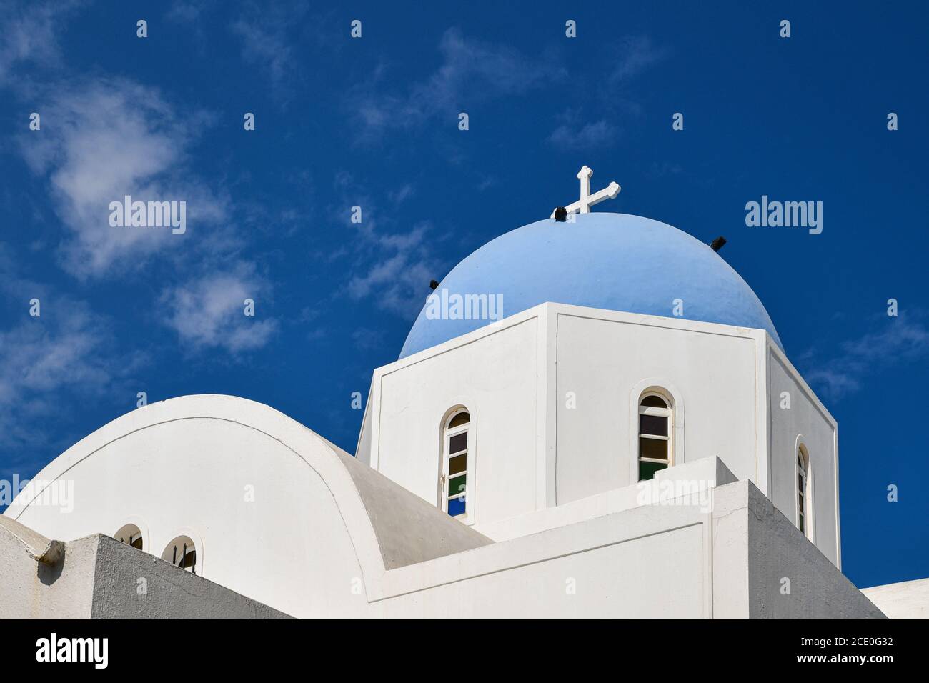 Santorini and its white houses with blue roofs Stock Photo - Alamy