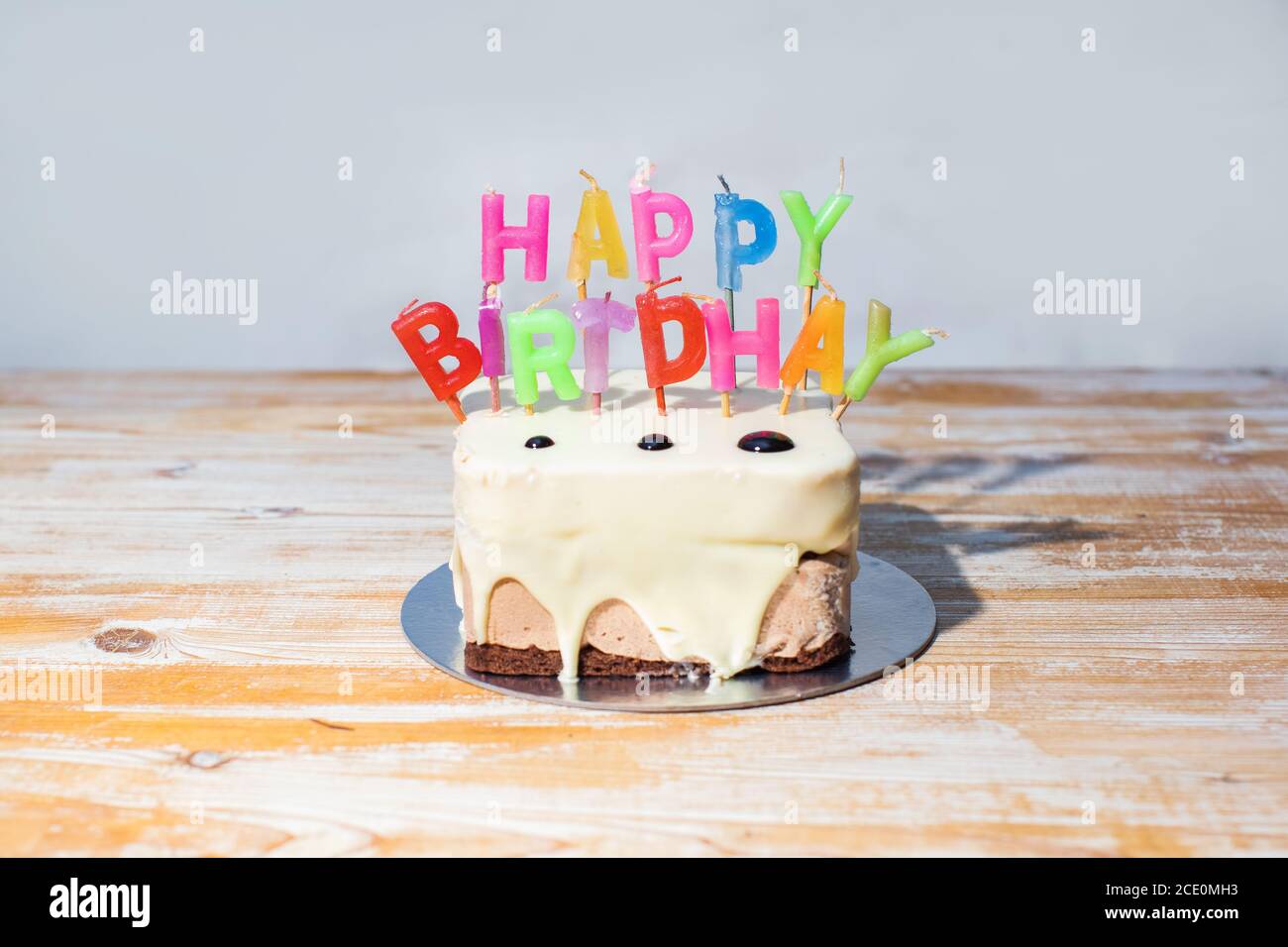 birthday cake with candles on the table Stock Photo - Alamy